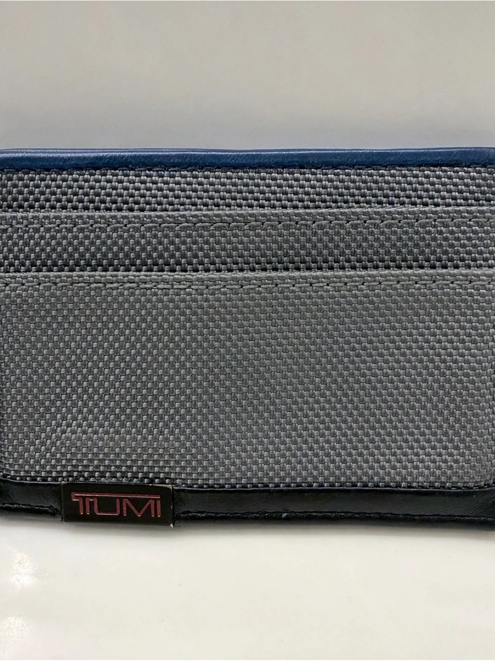 Tumi Gray Canvas and Black Trim Card Sleeve with Navy Accent
